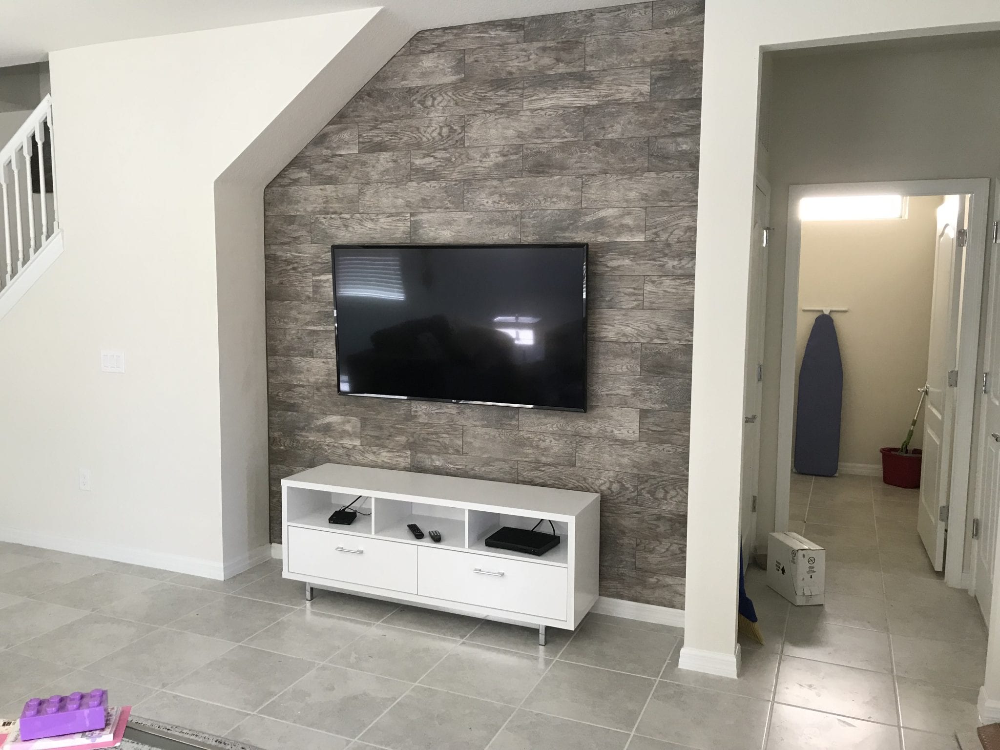 Wood plank TV accent wall